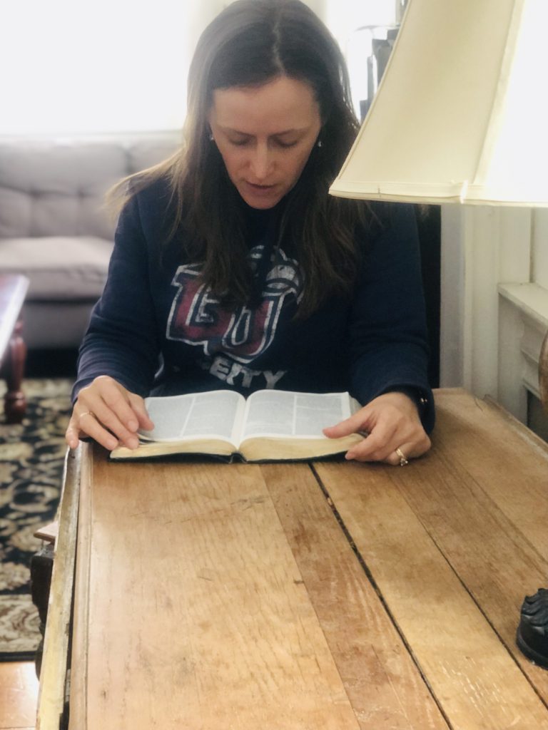 girl reading a Bible