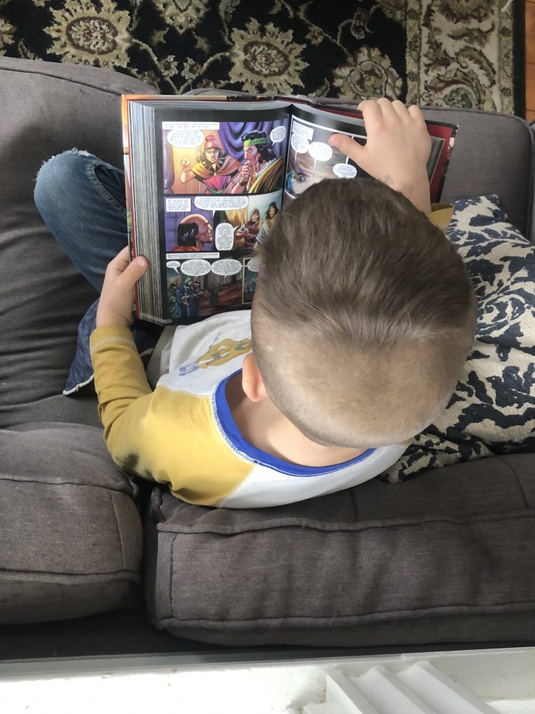 boy reading Bible