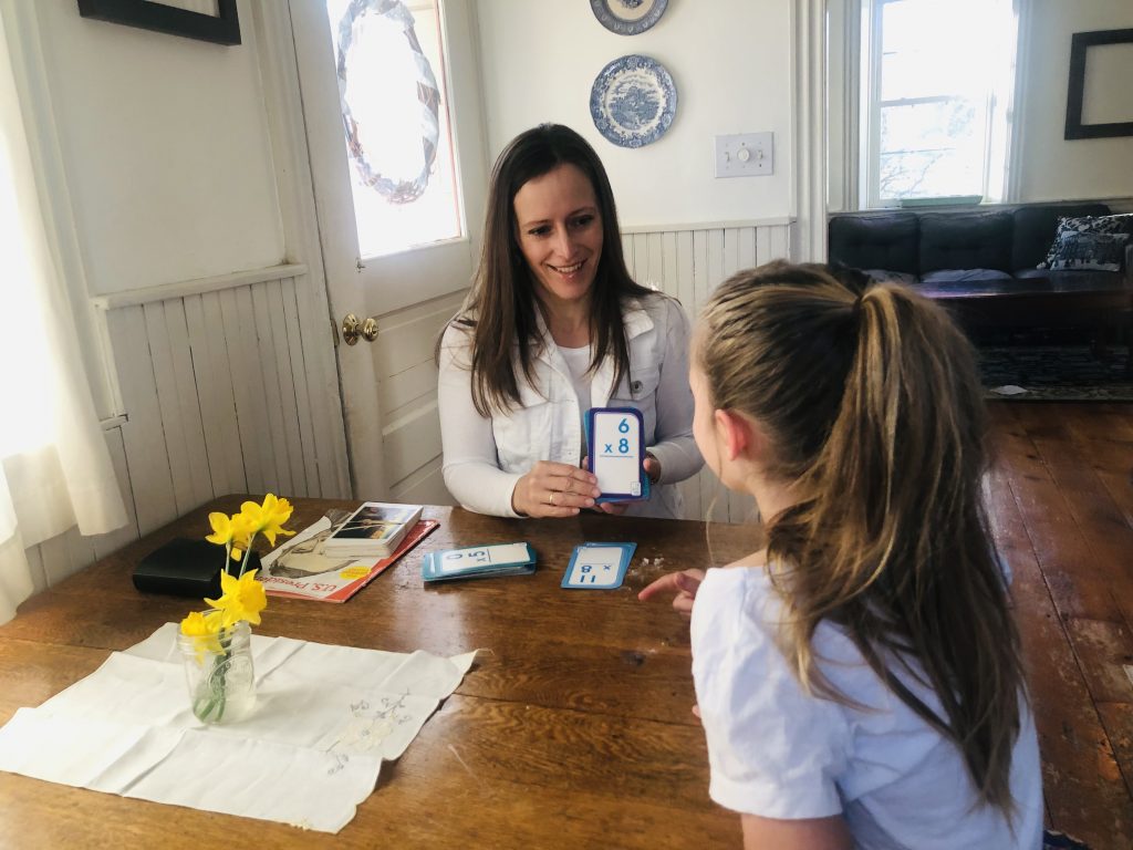 mom and daughter doing multiplication facts