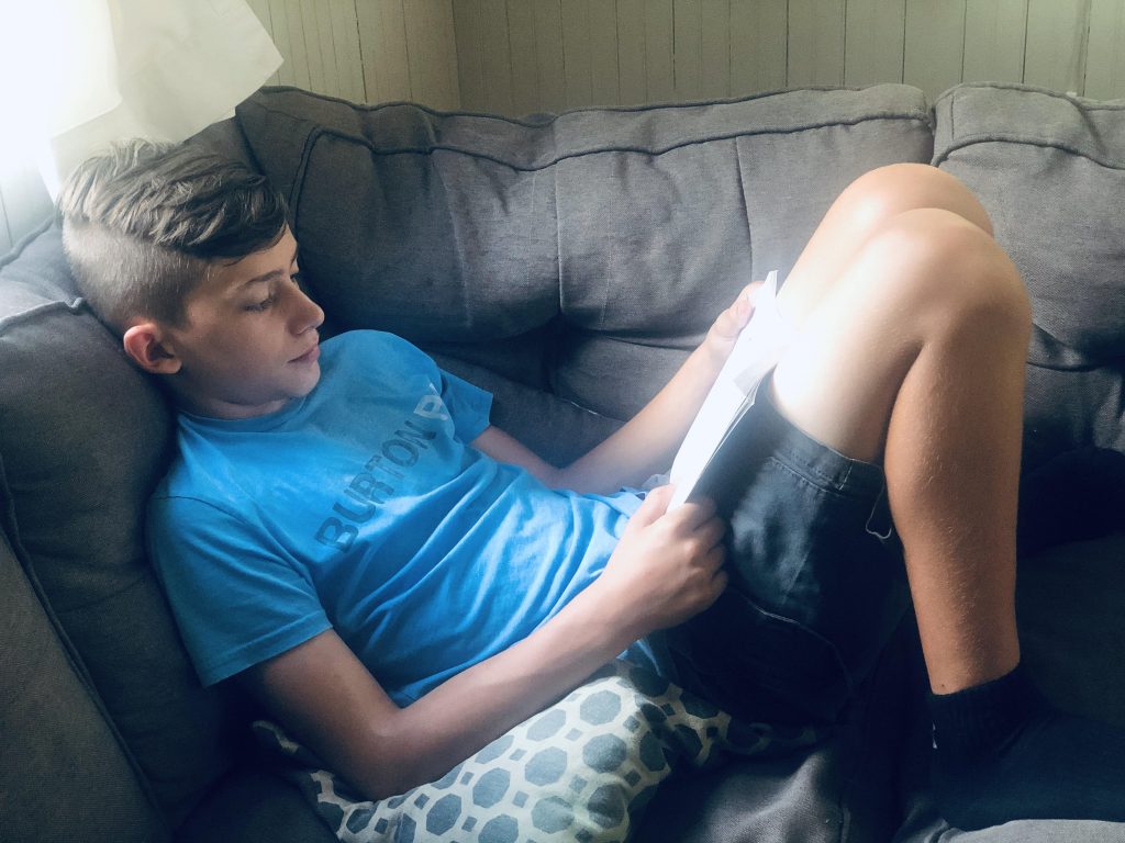 Boy reading a book