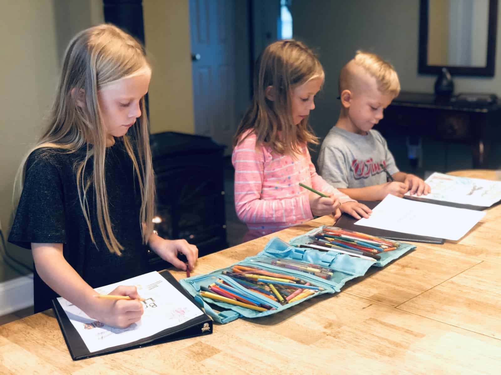 kids looking at portfolios